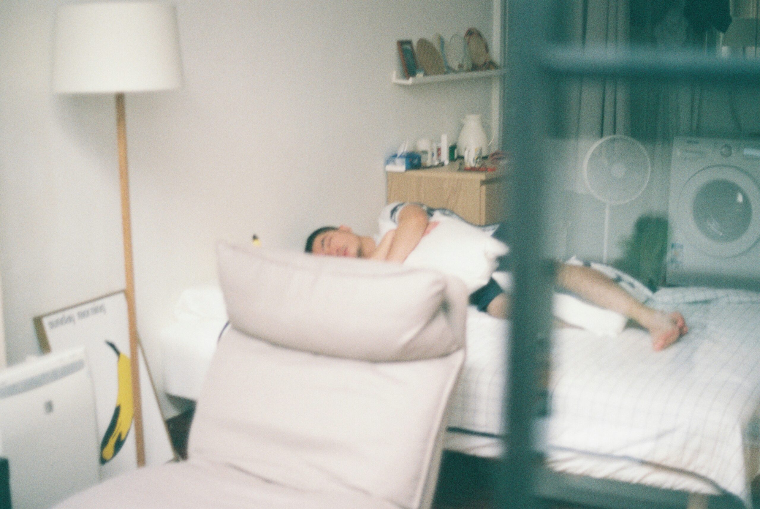 how to stop overthinking at night - peaceful bedroom with person sleeping calmly at night - Photo by lian xiao on Unsplash